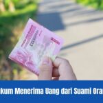 hukum menerima uang dari suami orang